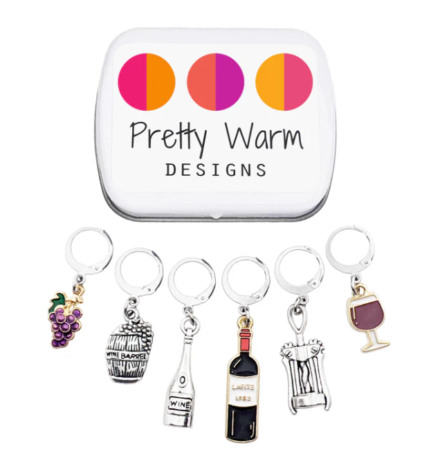 Crochet stitch markers with storage tin