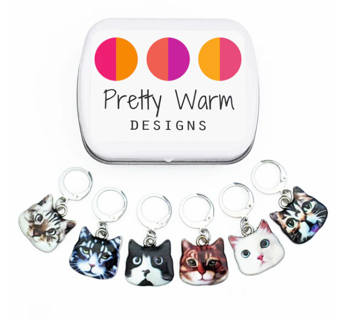 Crochet stitch markers with storage tin