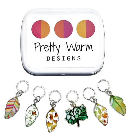 Knitting stitch markers with storage tin