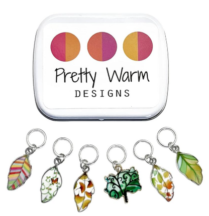 Knitting stitch markers with storage tin