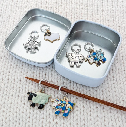 Knitting stitch markers with storage tin