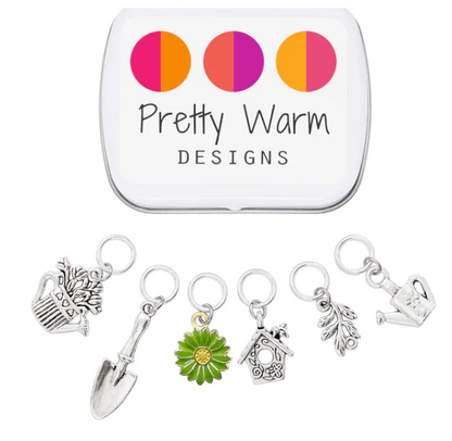 Knitting stitch markers with storage tin